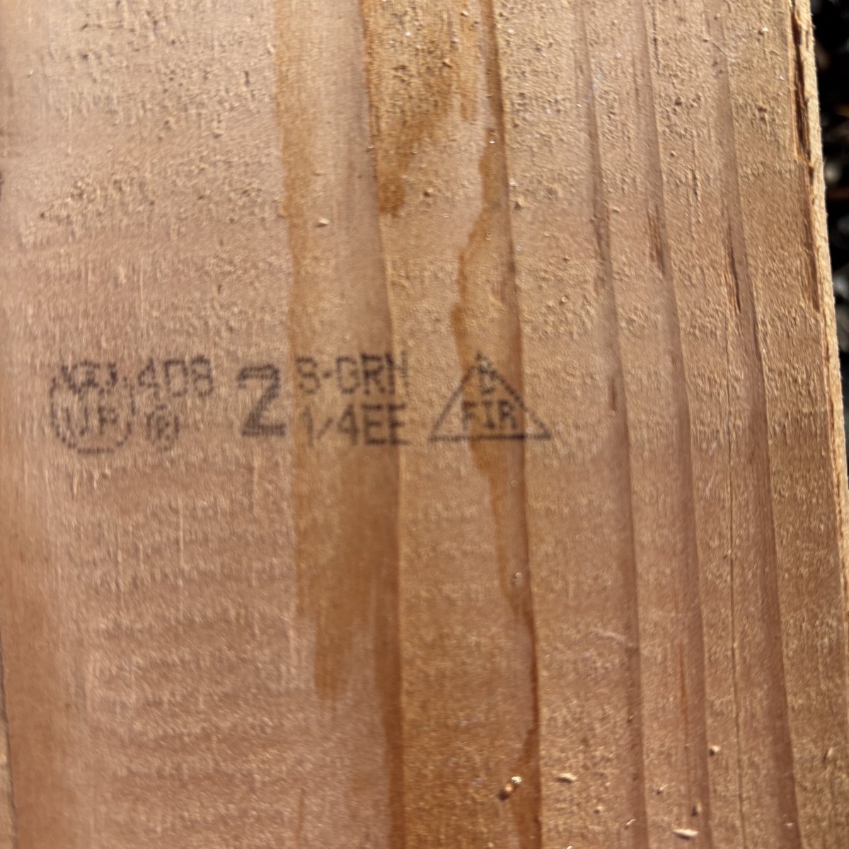 Grade stamp on 2x #2 green Douglas fir lumber at Dynamic Lumber Solutions yard