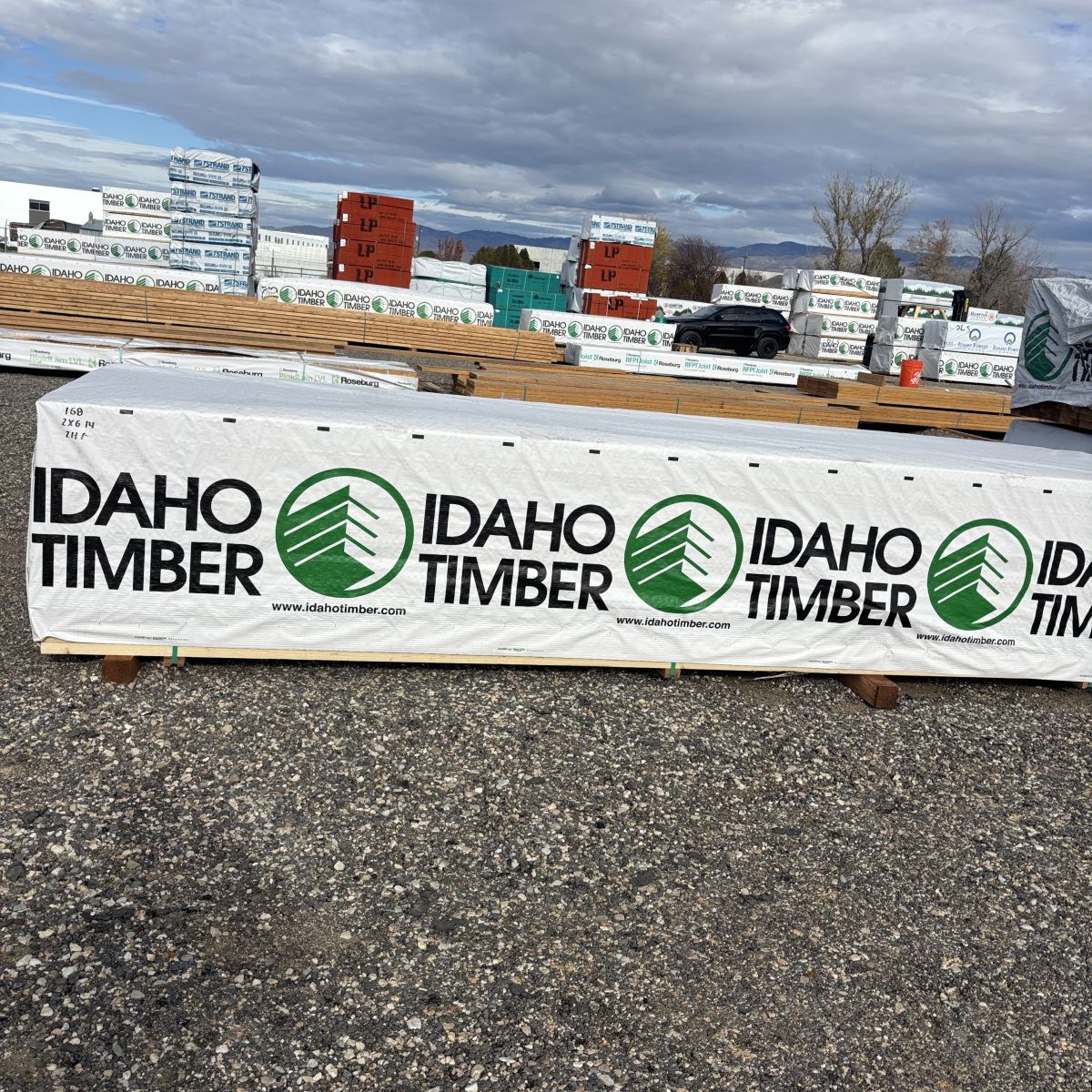 Full unit of 2×6-14′ #2 kiln-dried Hem-Fir lumber at our Boise lumberyard with foothills in the background