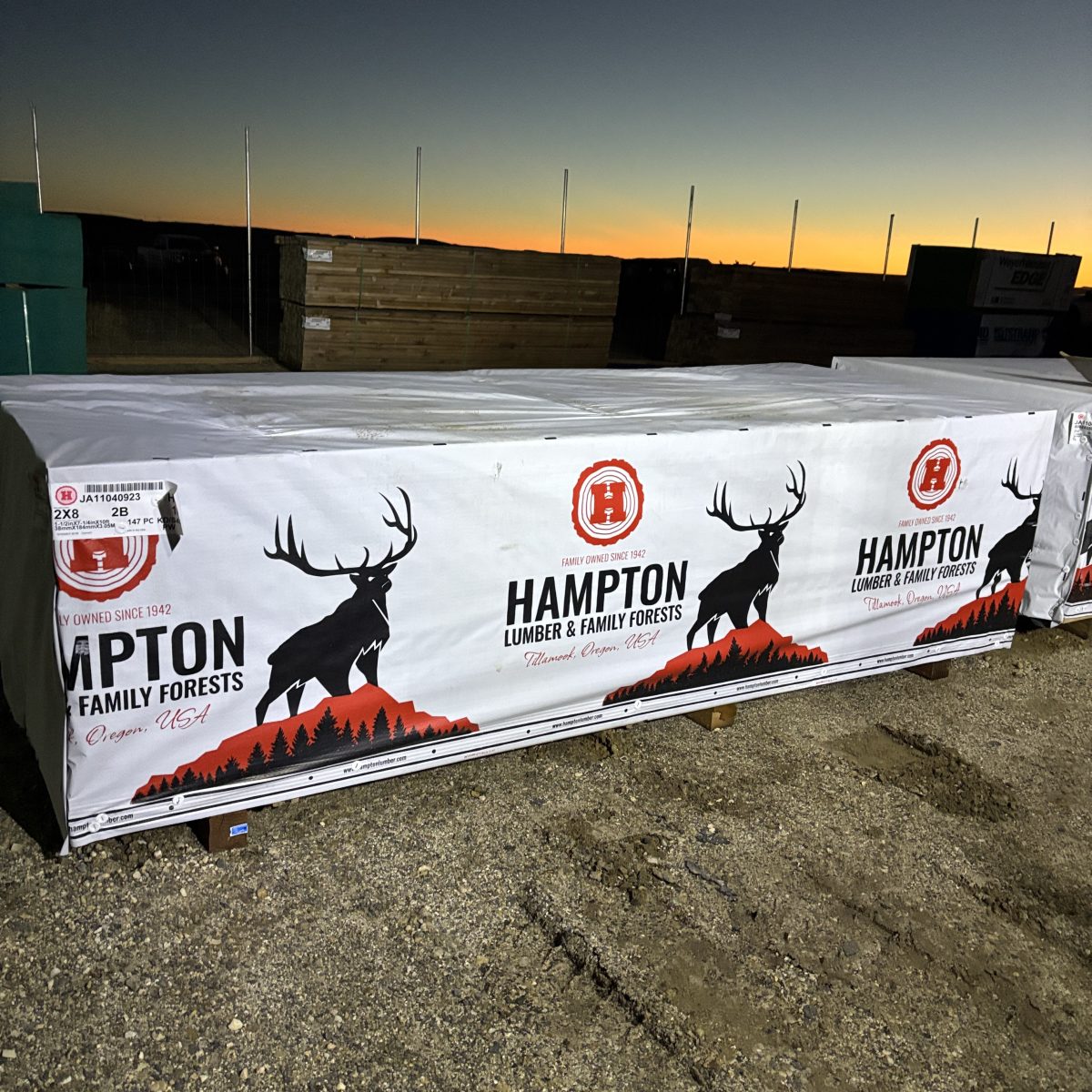 2×8 10-foot #2 kiln-dried Hem-Fir lumber stacked at our Boise lumberyard at night