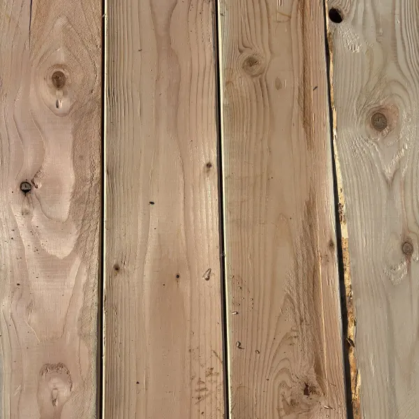 Top-down view of Douglas Fir wood texture on 2×8 #2 kiln-dried lumber showing grain pattern and surface detail